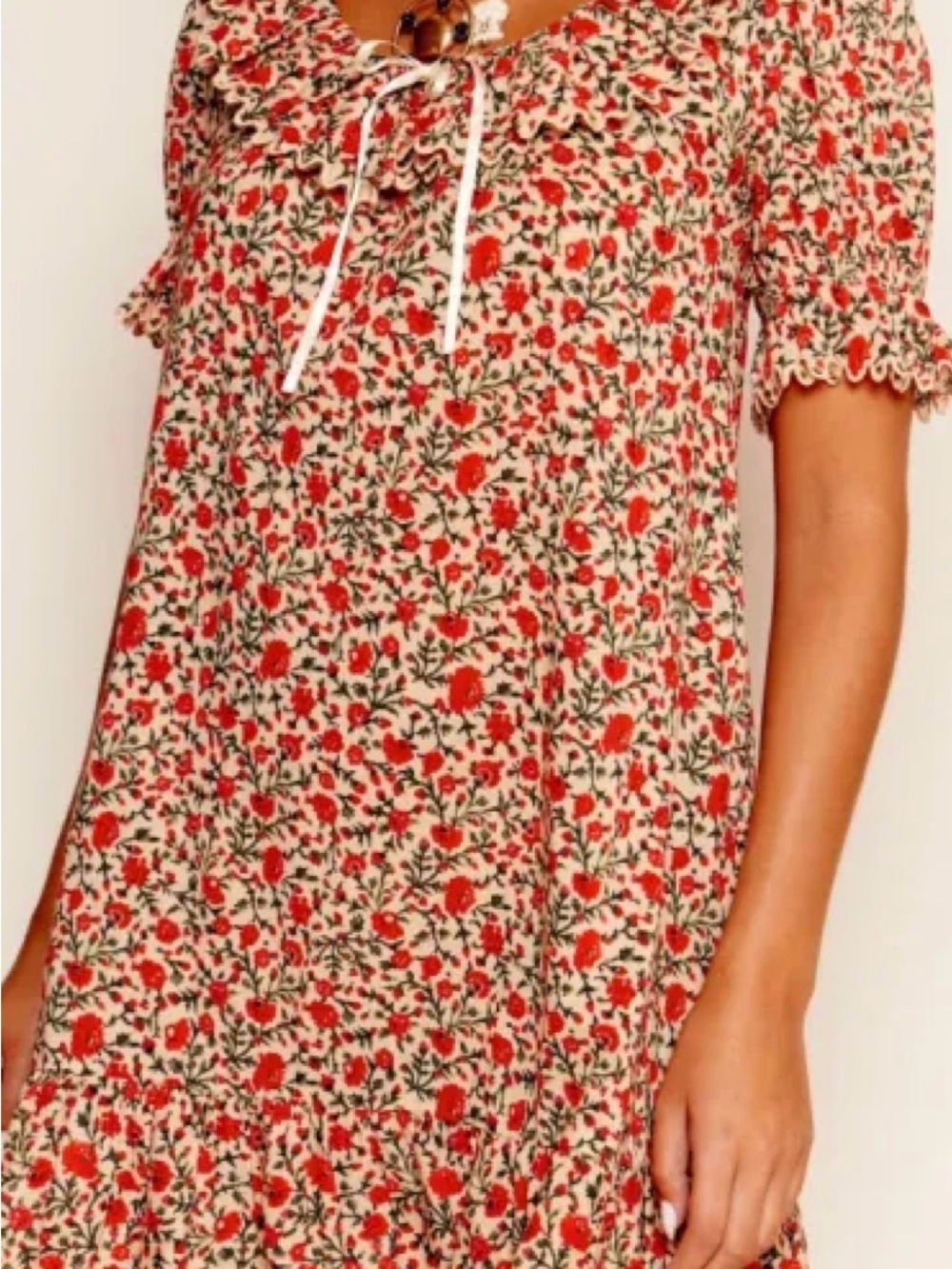 RIXO Red and Green Floral Cotton Ruffle dress
On cream.